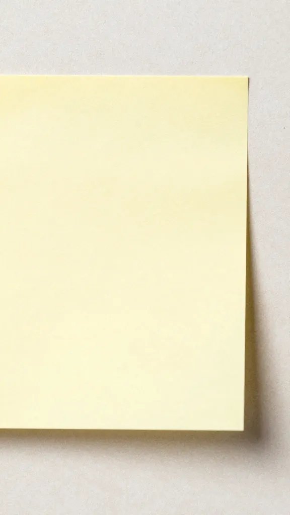 closeup sticky note marking sun patch edge on tile