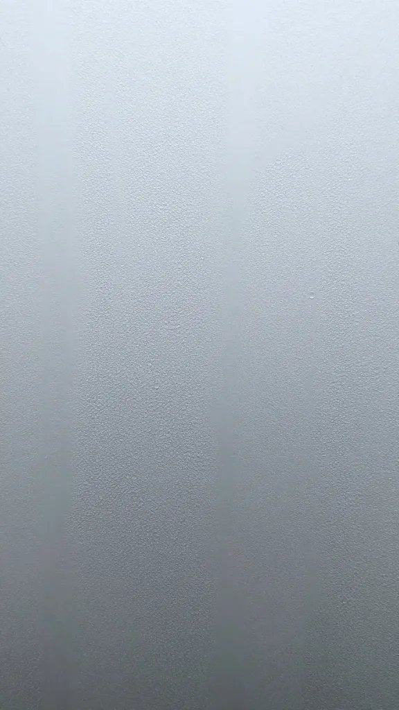 misted glass showing fine condensation beads, macro