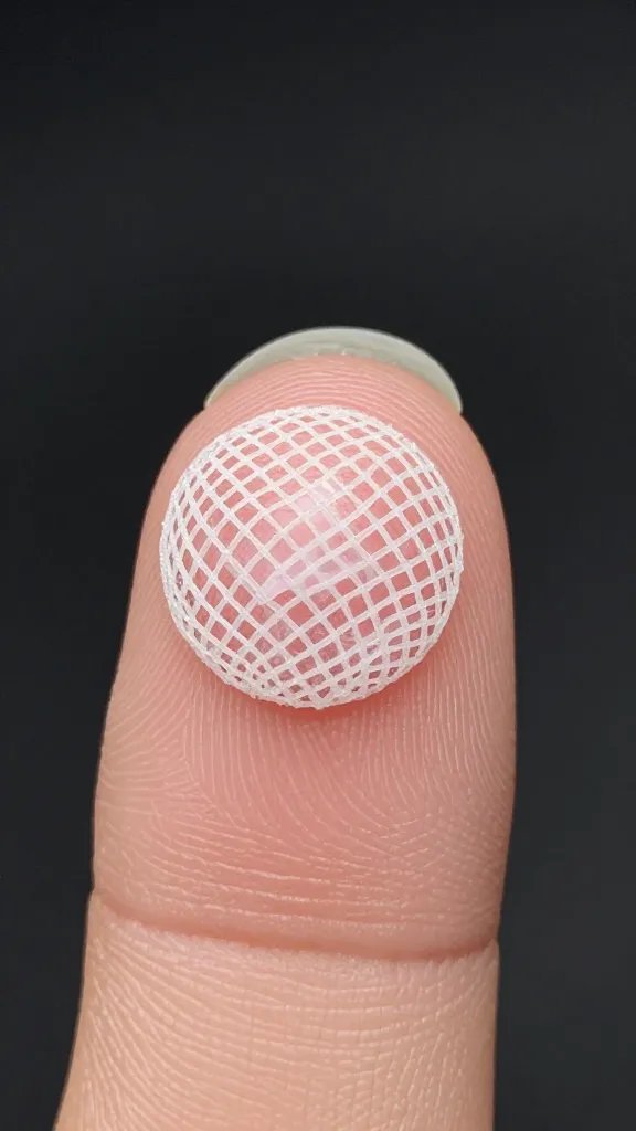 mesh barrier circle on fingertip, macro detail